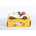 Dinky Toys diecast vehicle 108 MG Midget with cream body, racing number 28, maroon interior, white