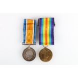 Medals of Reverend J W Robinson comprising a WWI British war medal and victory medal [REV J W
