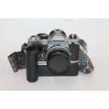 NIKON FM SLR camera, serial number 2163034, with Nikon Nikkor 50mm 1:2 lens, serial number