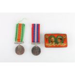 WWII war medal and Defence medal in cardboard issue box addressed to 'Margaret Napier, Dunainds,