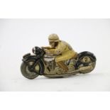 Schuco of Germany, a tinplate clockwork motorcycle and rider #2 N1012, 13cm long.