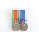 Medals of Police Sergeant Finlay MacKenzie comprising an Elizabeth II Police long service and good