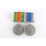 Medals of Police Inspector John E Grey comprising a George VI Police long service and good conduct