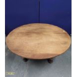 Circular oak dining table, c.1870's, in the early Arts and Crafts manner, possibly Philip Webb, on