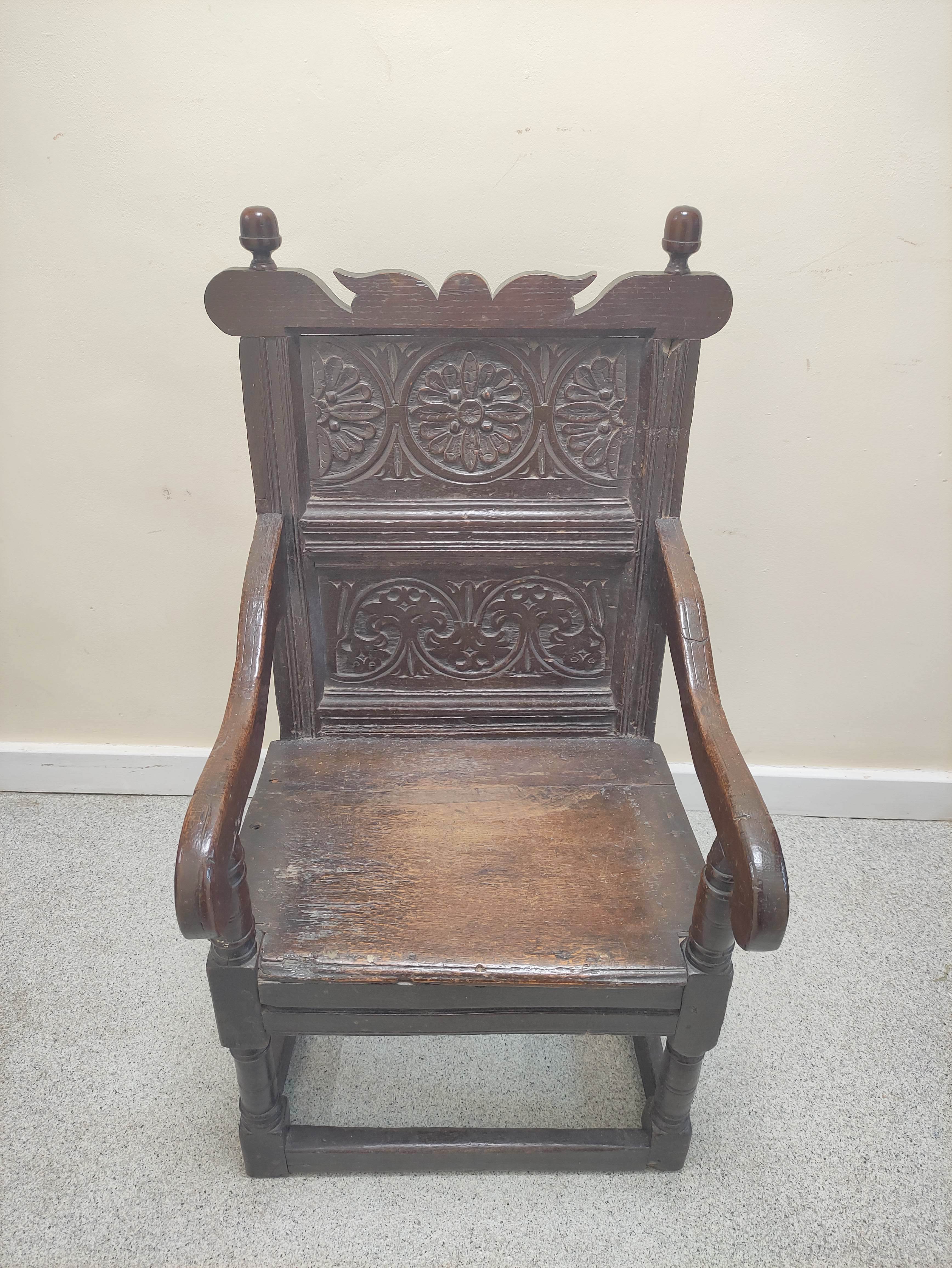 17th century wainscot chair, the foliate carved panel back with acorn finials, above solid seat, - Image 2 of 6