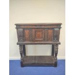 Early 17th century style oak buffet, the carved inlaid front fitted with cupboards and inlaid