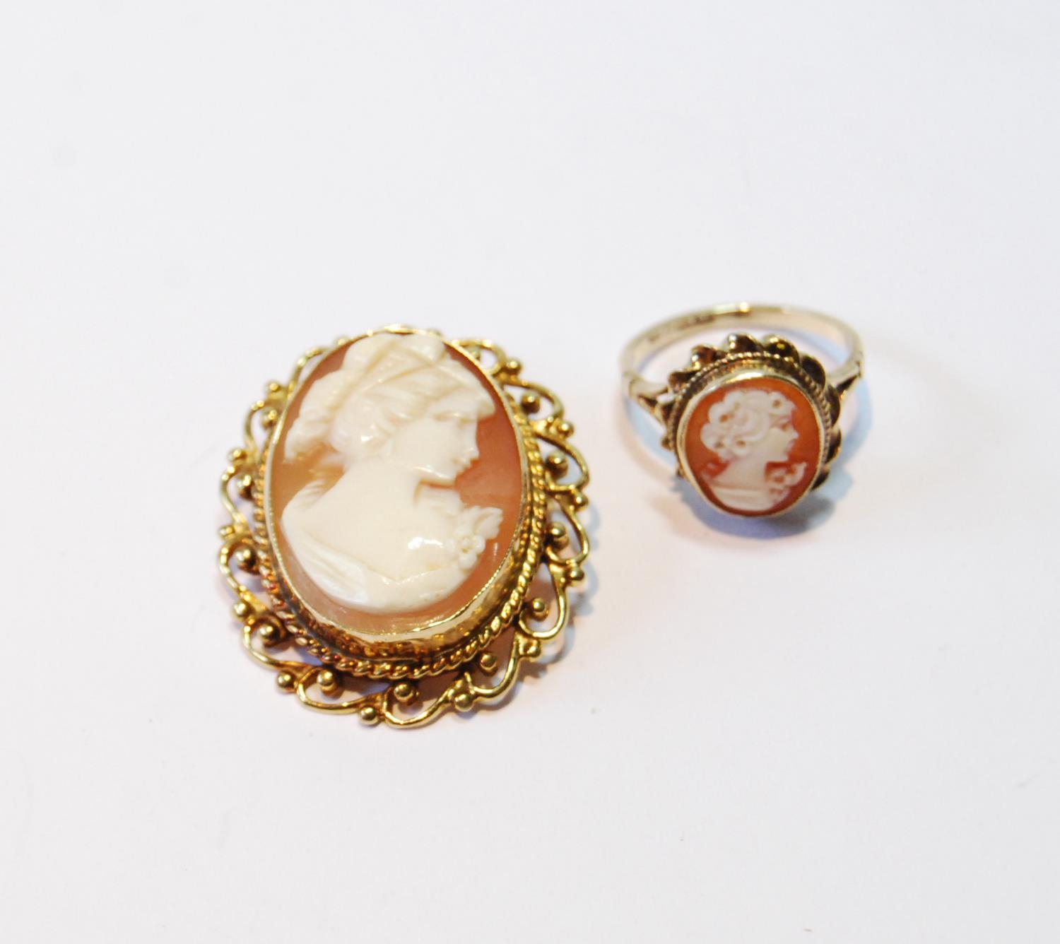 Cameo brooch and a similar ring, both 9ct gold, 10g gross.  (2)