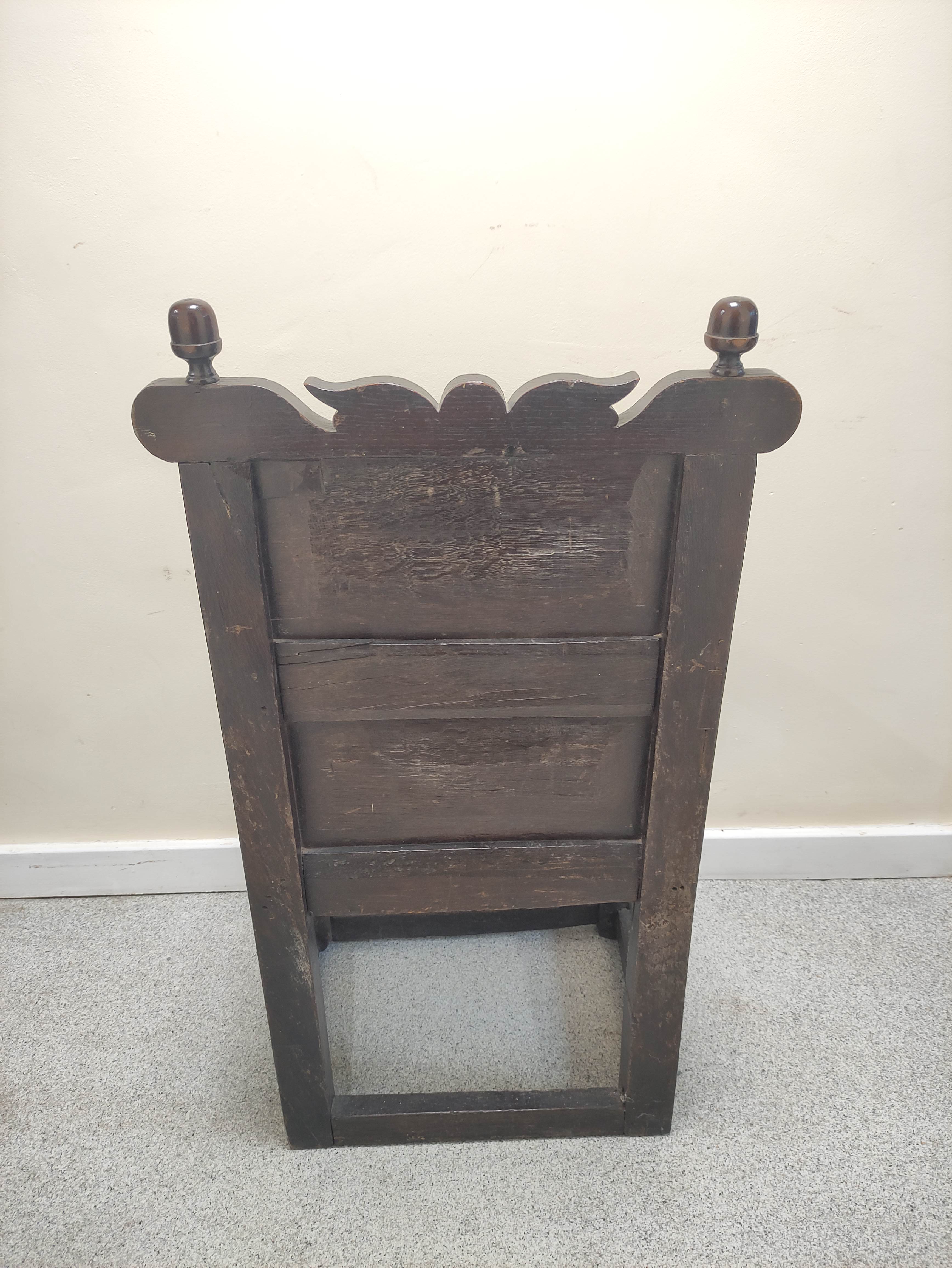 17th century wainscot chair, the foliate carved panel back with acorn finials, above solid seat, - Image 6 of 6