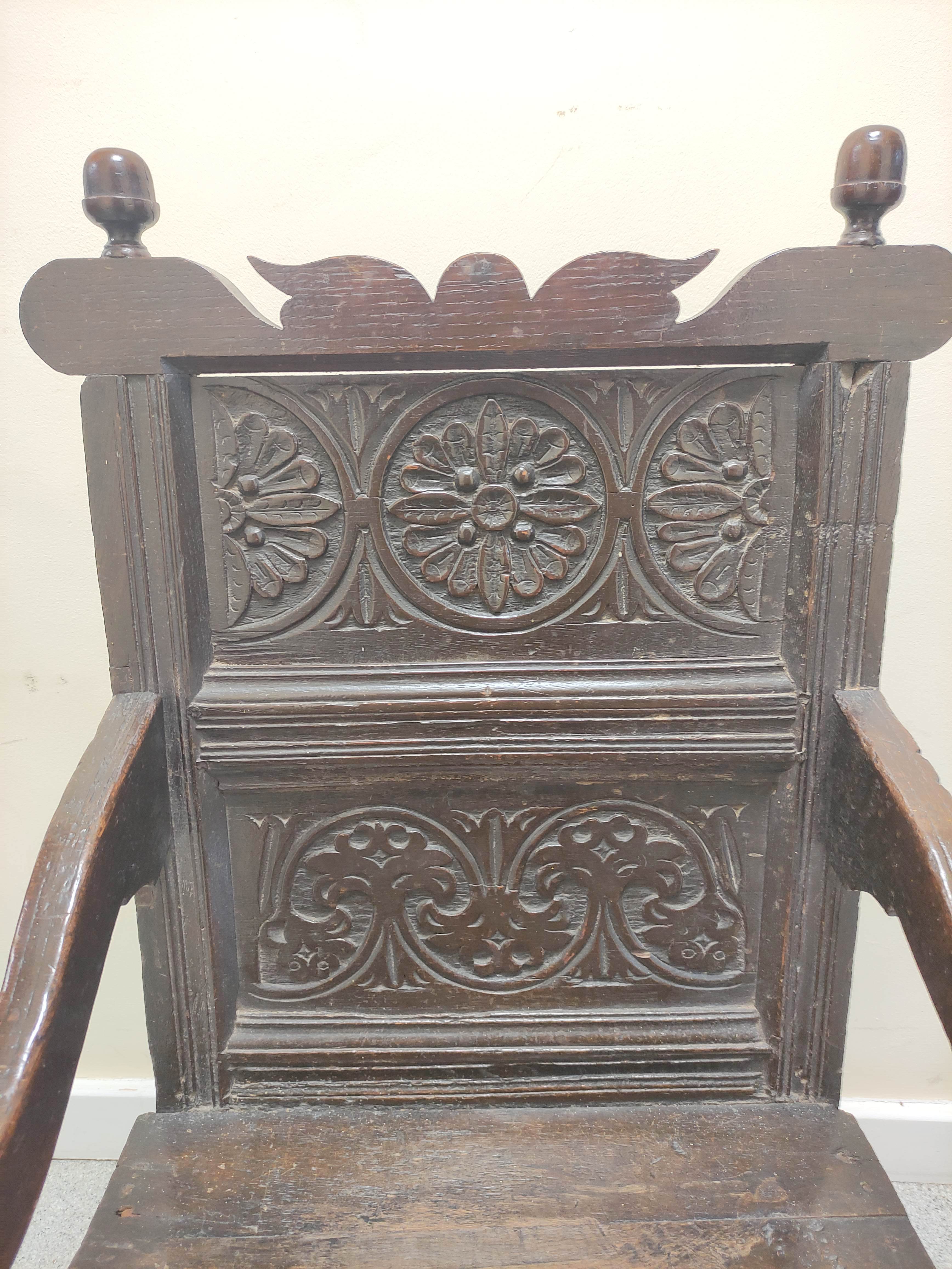 17th century wainscot chair, the foliate carved panel back with acorn finials, above solid seat, - Image 3 of 6