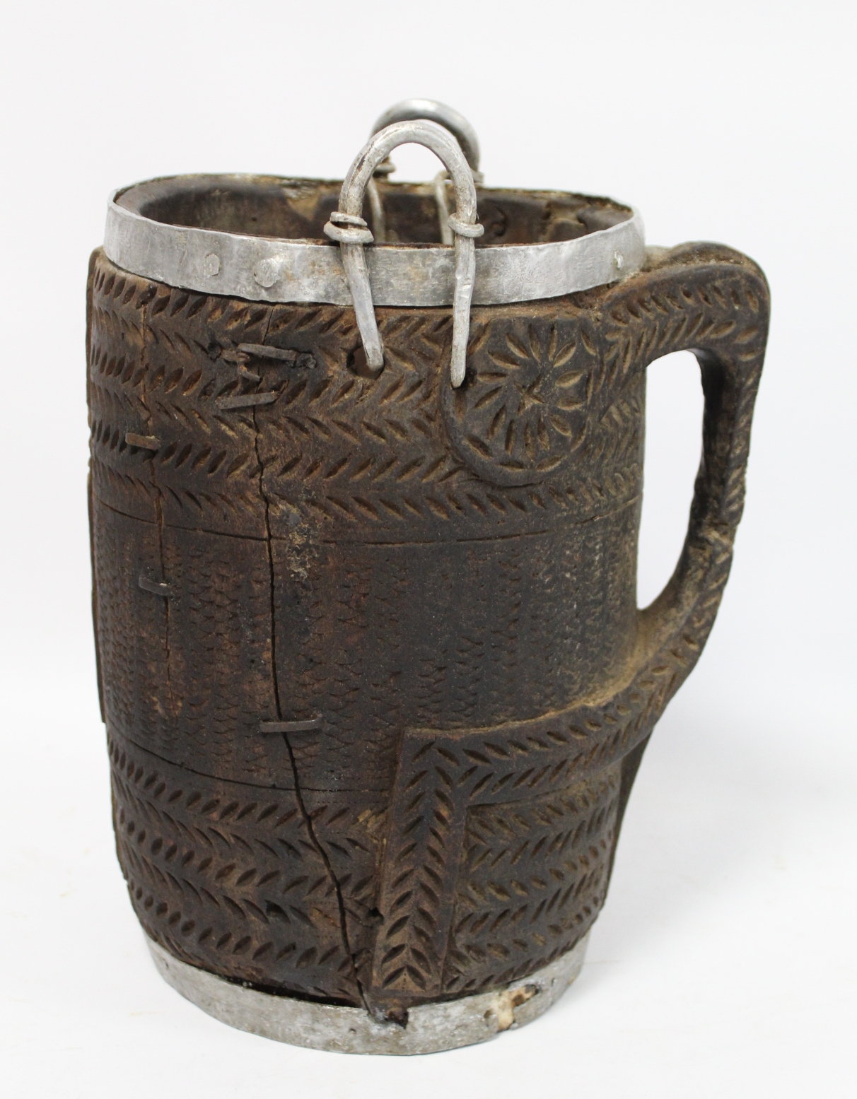 Antique Nepalese or Tibetan yak milk pot with metal banding to rim and foot, metal carrying loops,