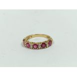 Diamond and ruby five stone ring, in gold '730', size 'M½'.