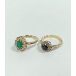 Emerald cluster ring in 9ct gold and another, 18ct. (2).