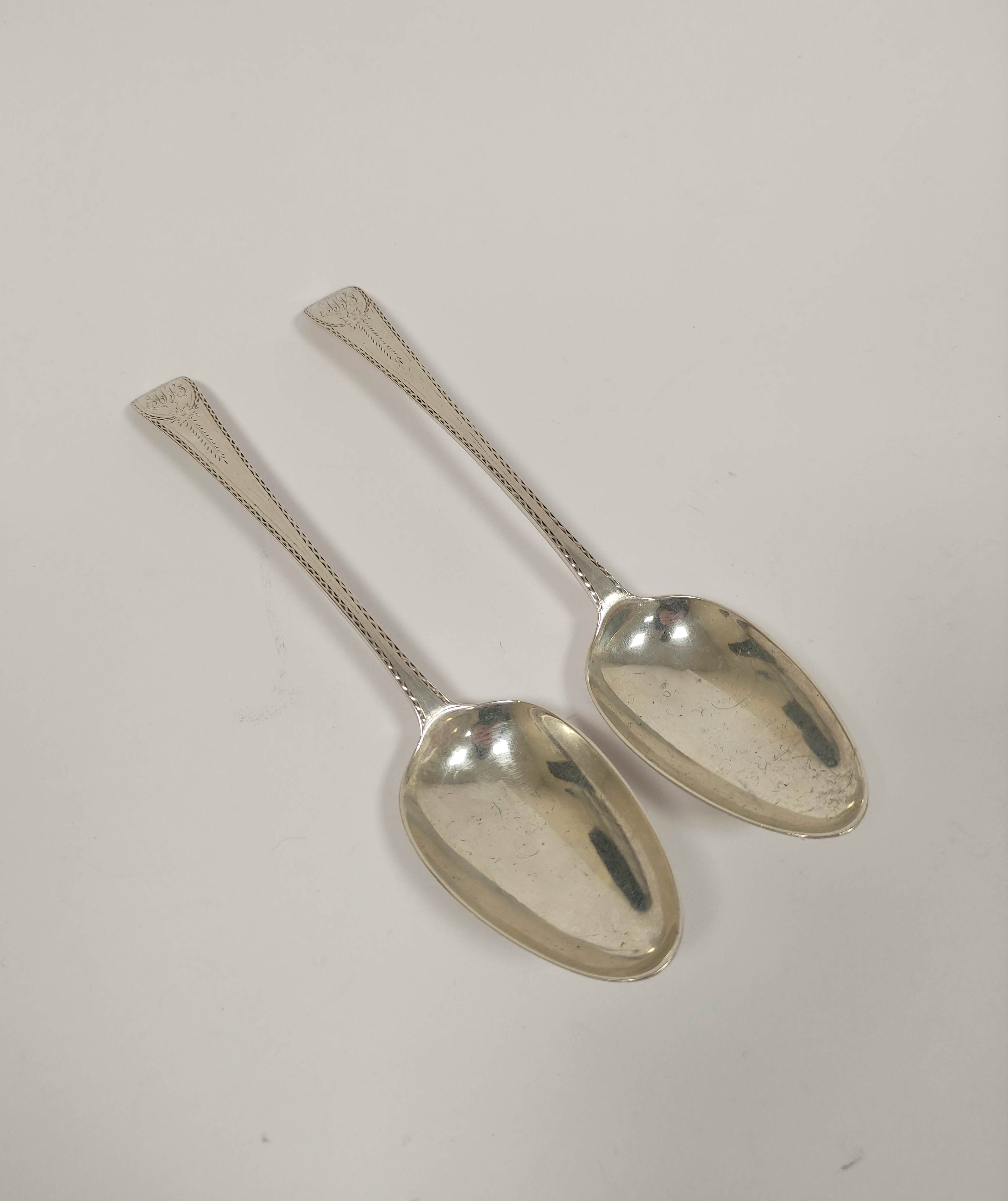Duty Drawback mark - Pair of silver bright cut table spoons, maker's mark rubbed, probably George