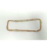 18ct gold necklet of ovoid and baton links, Chester 1914, 67cm, 20.4g.