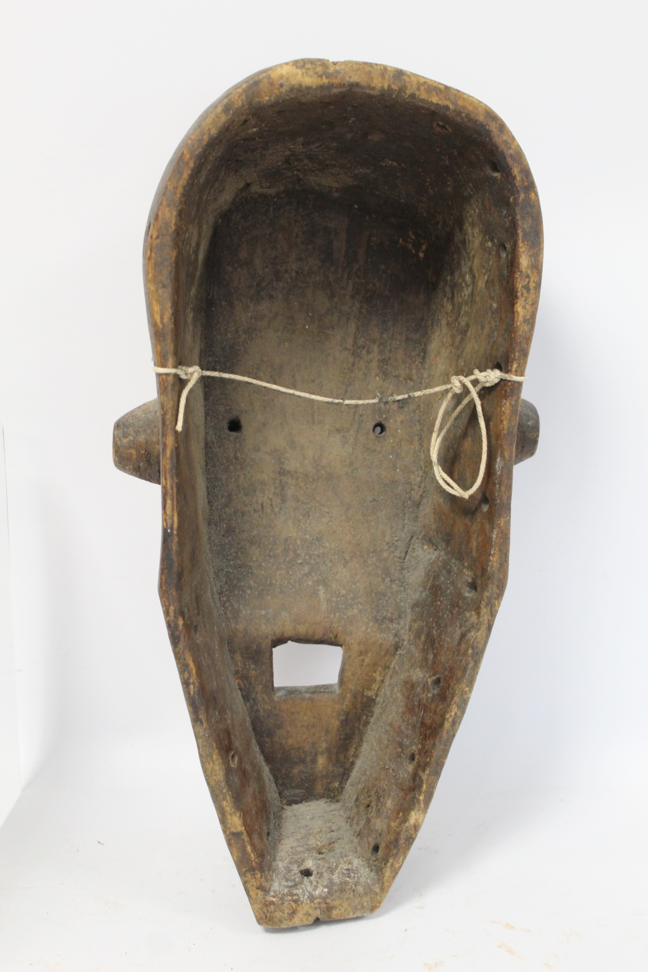 African tribal carved wooden mask of large elongated form with arched brow, conical ribbed eyes, - Image 3 of 8