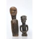 Two African carved wooden half torso figures, 39cm and 27cm high.