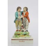 19th century Staffordshire pearlware figure group "Friendship" depicting two boys embracing with dog