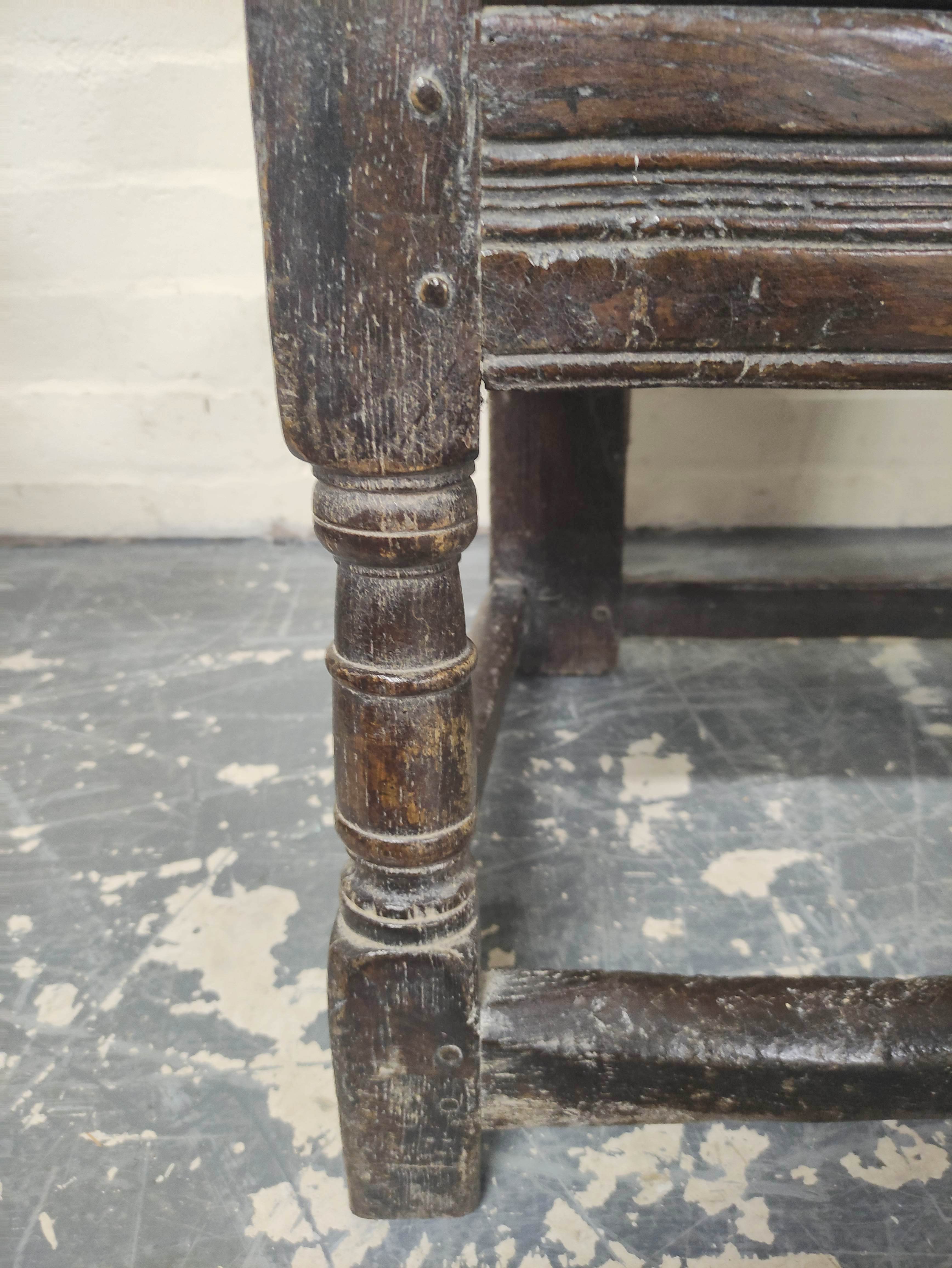 Near pair 17th century oak panel back armchairs, West Yorkshire, the shaped top rails with carved - Image 5 of 7