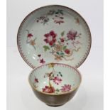 18th century Chinese Batavian famille rose tea bowl and saucer decorated with floral sprays, the
