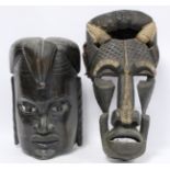 African zoomorphic pierced and carved wooden mask decorated with white pigment, with woven cane