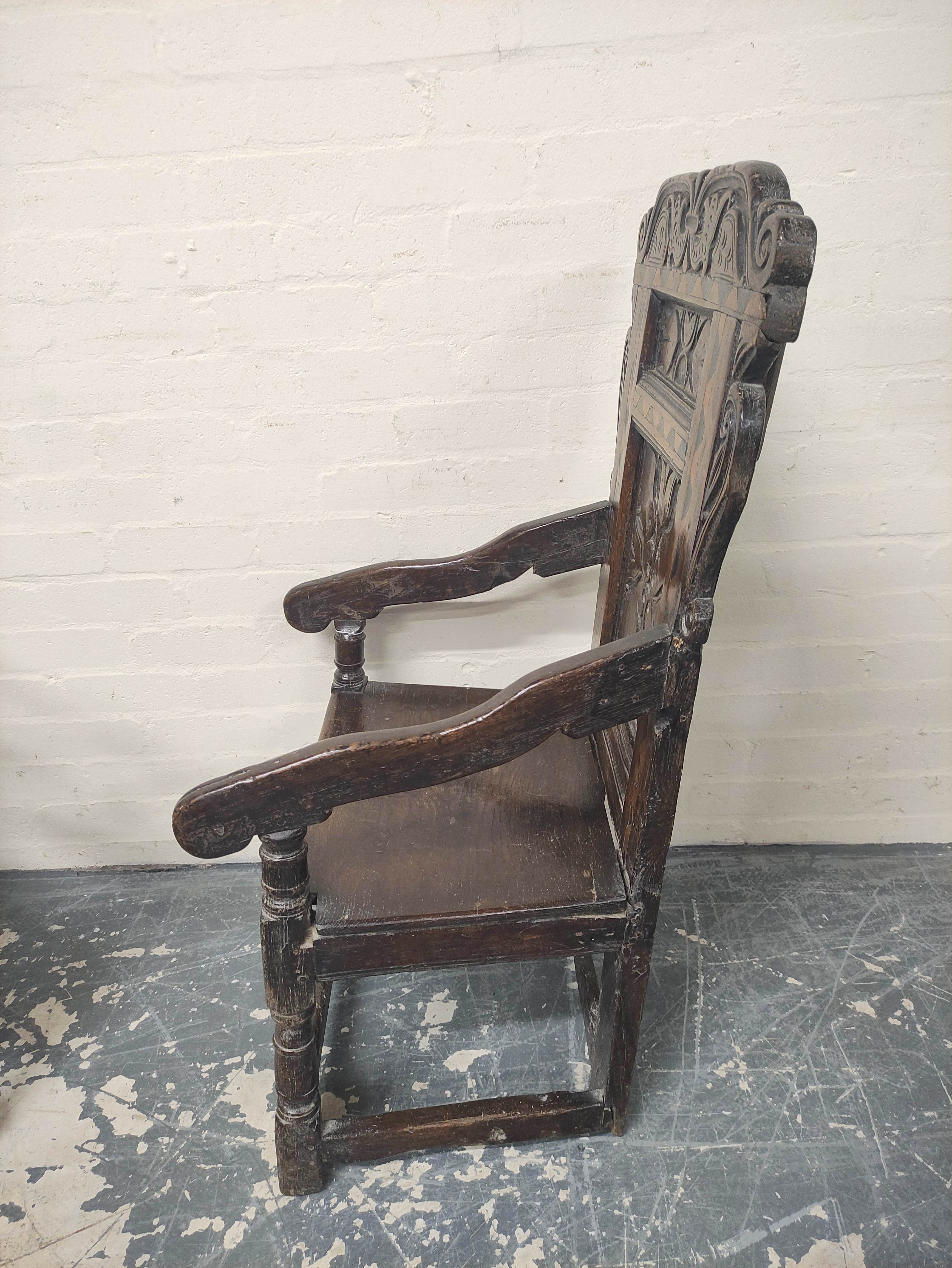 Near pair 17th century oak panel back armchairs, West Yorkshire, the shaped top rails with carved - Image 6 of 7