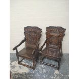 Near pair 17th century oak panel back armchairs, West Yorkshire, the shaped top rails with carved