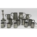 Collection of thirteen antique pewter tankards of various size, the largest 16cm high; also a pewter