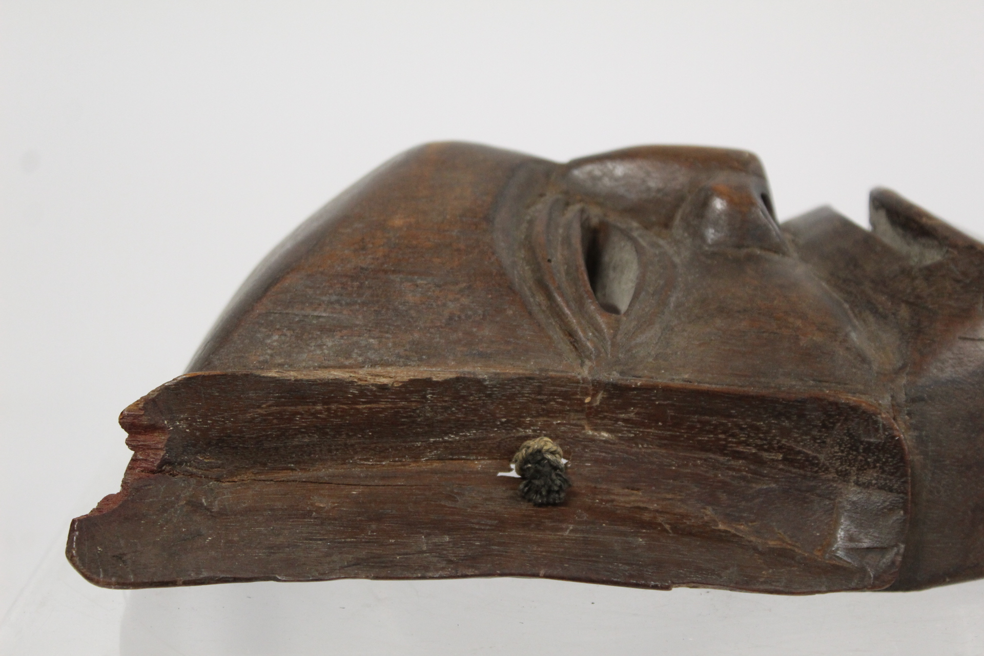 African carved hardwood monkey mask decorated with white and red pigments, with cane binding and - Image 13 of 13