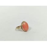 Ring with oval coral cabochon in 9ct gold, size 'L½' and an opal set pin. (2)