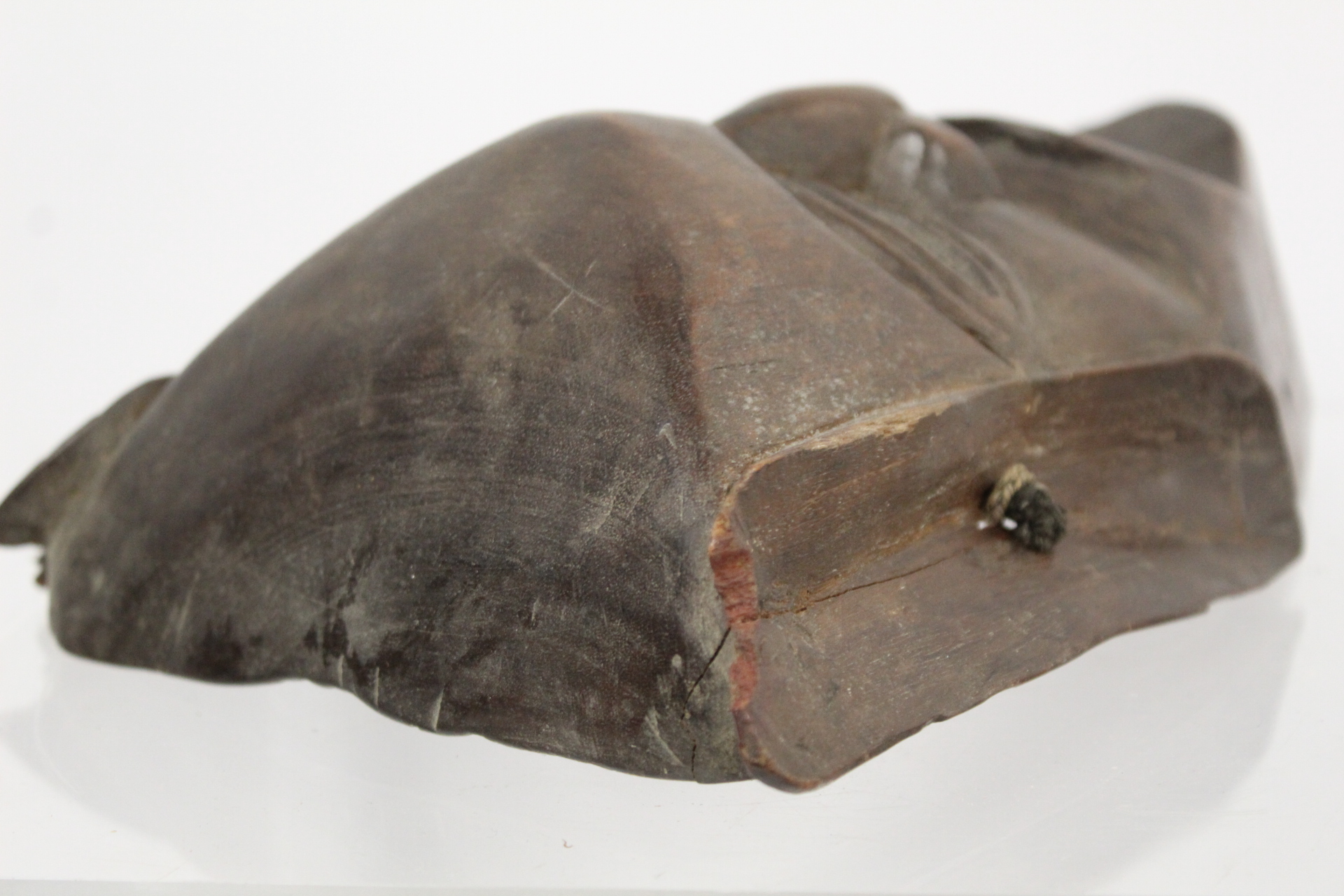 African carved hardwood monkey mask decorated with white and red pigments, with cane binding and - Image 12 of 13