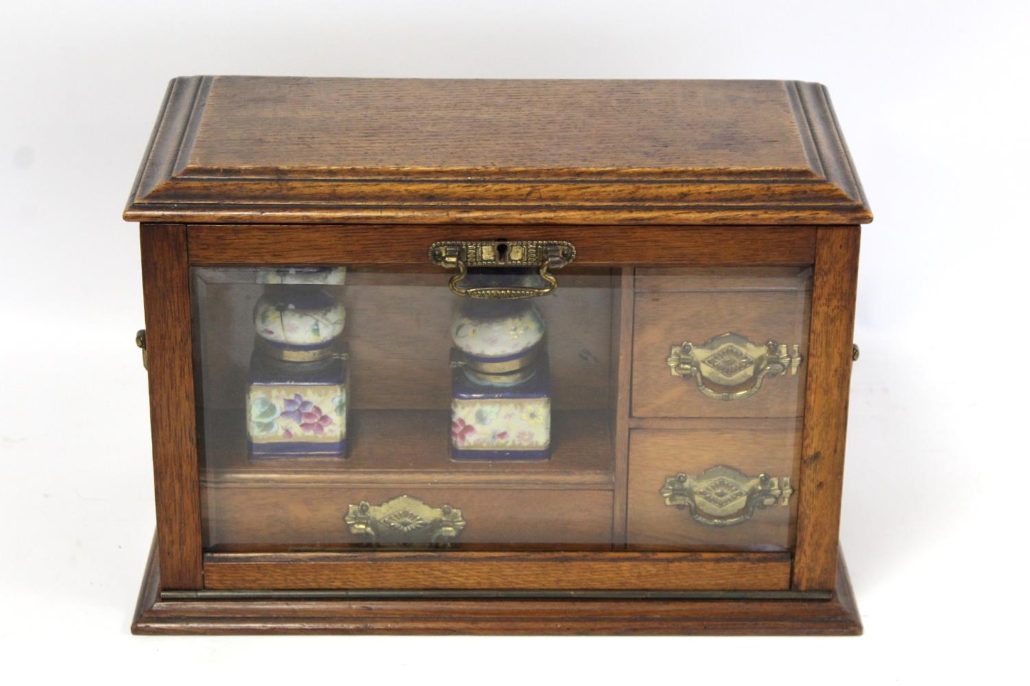 Unusual late 19th or early 20th century oak writing box of twin handled rectangular form with glazed