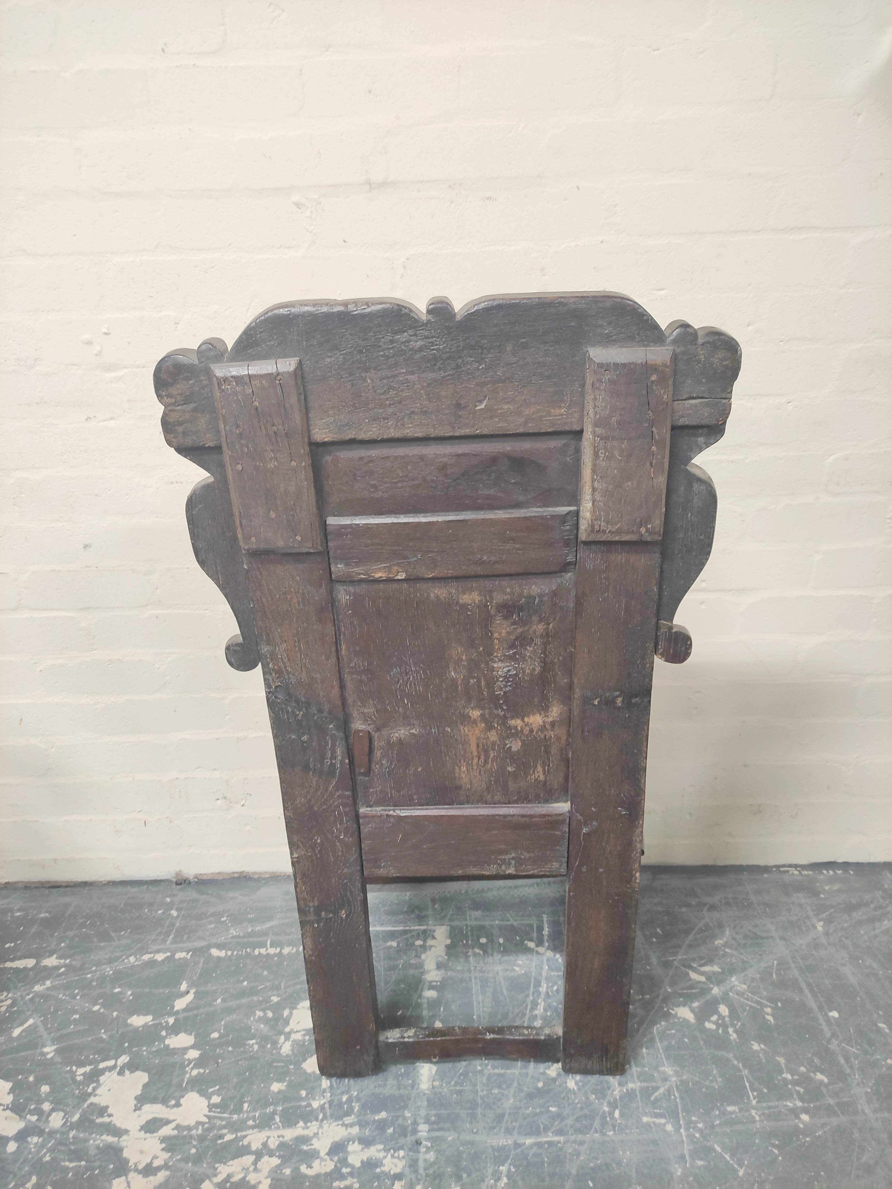 Near pair 17th century oak panel back armchairs, West Yorkshire, the shaped top rails with carved - Image 7 of 7