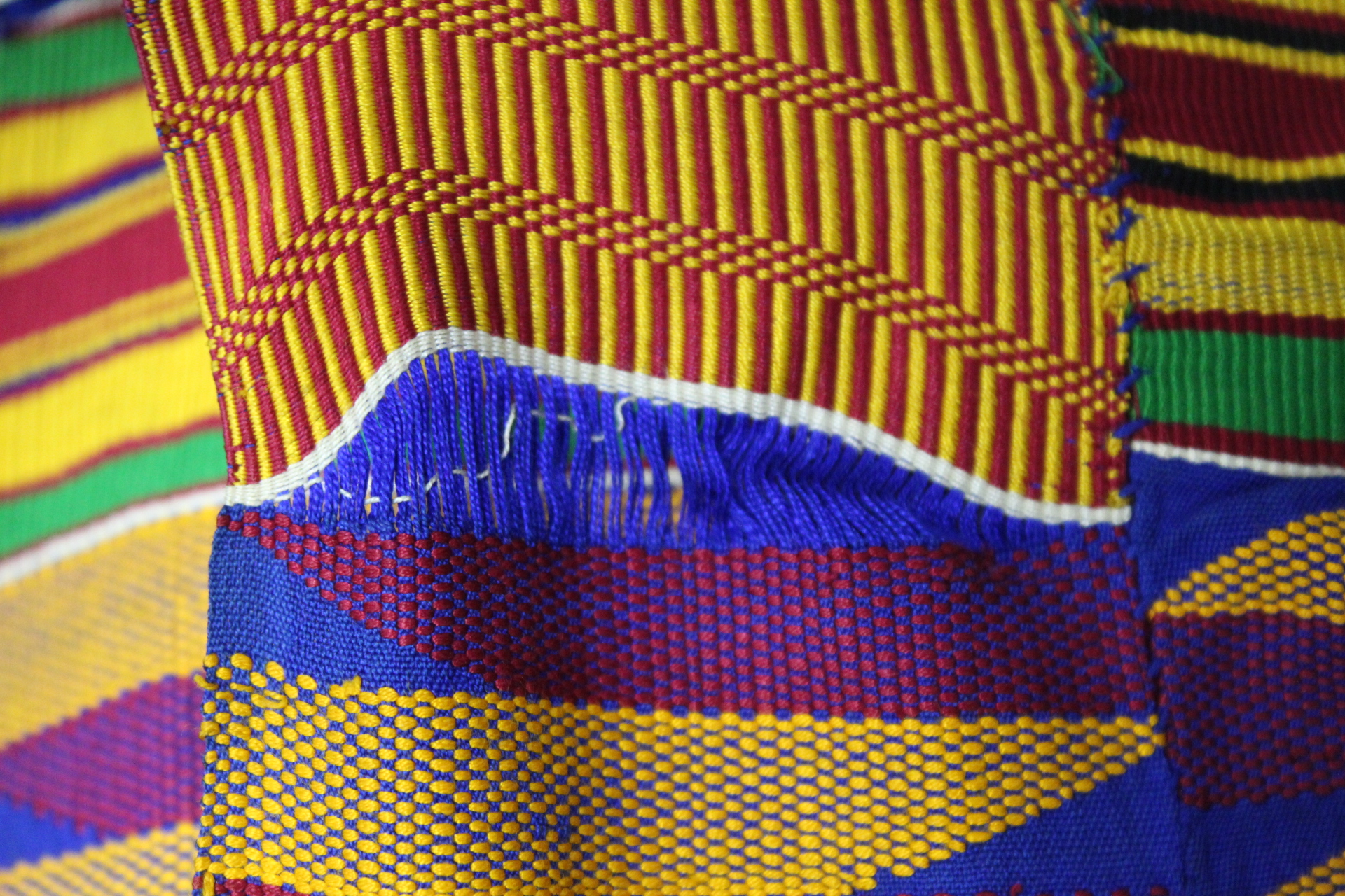 African Asanti Kente cloth in woven silk and cotton fabrics in predominantly blue, yellow, green and - Image 11 of 11