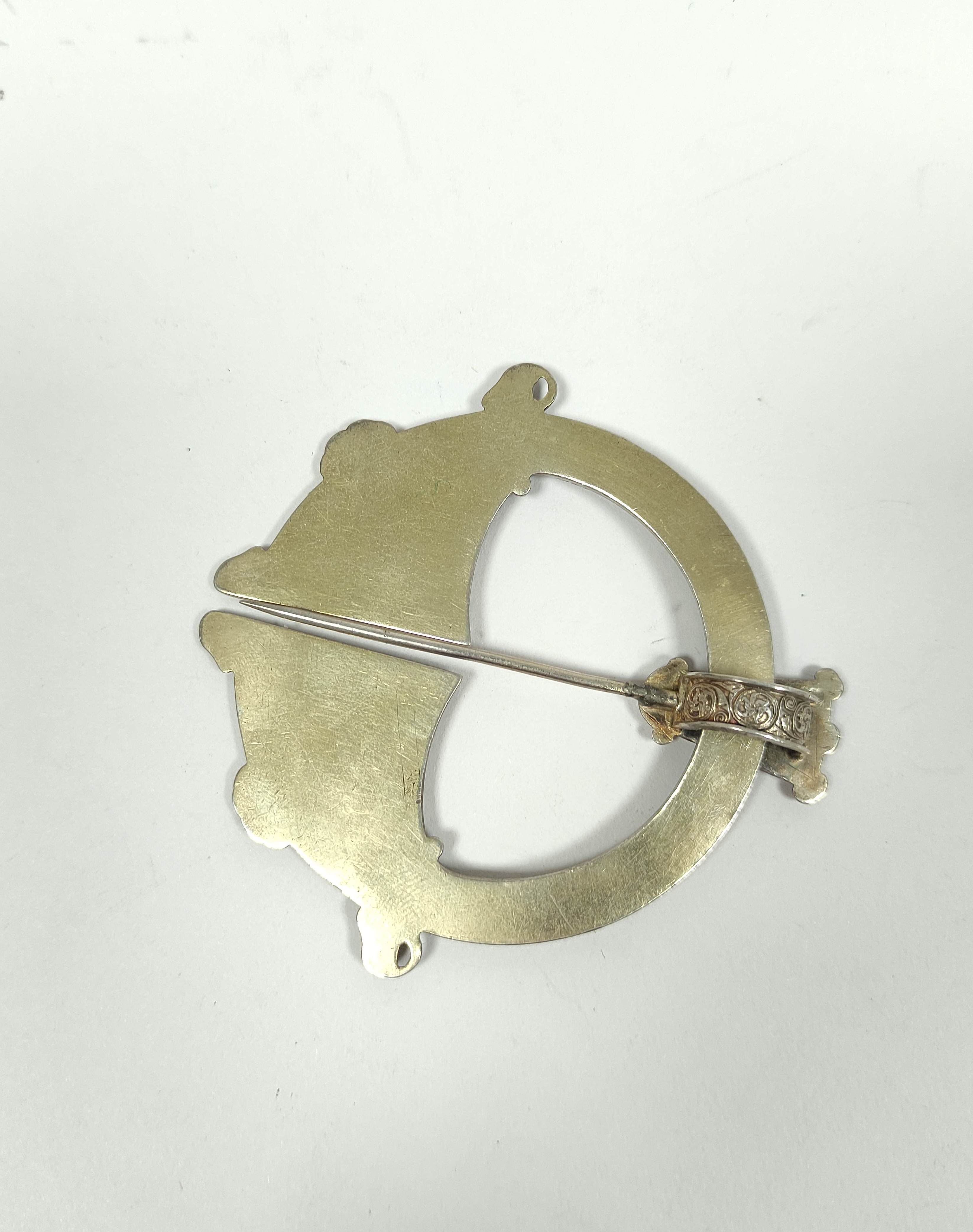 Silver gilt penannular pin, unmarked with embossed Celtic motifs and plain back, 70mm. - Image 4 of 4