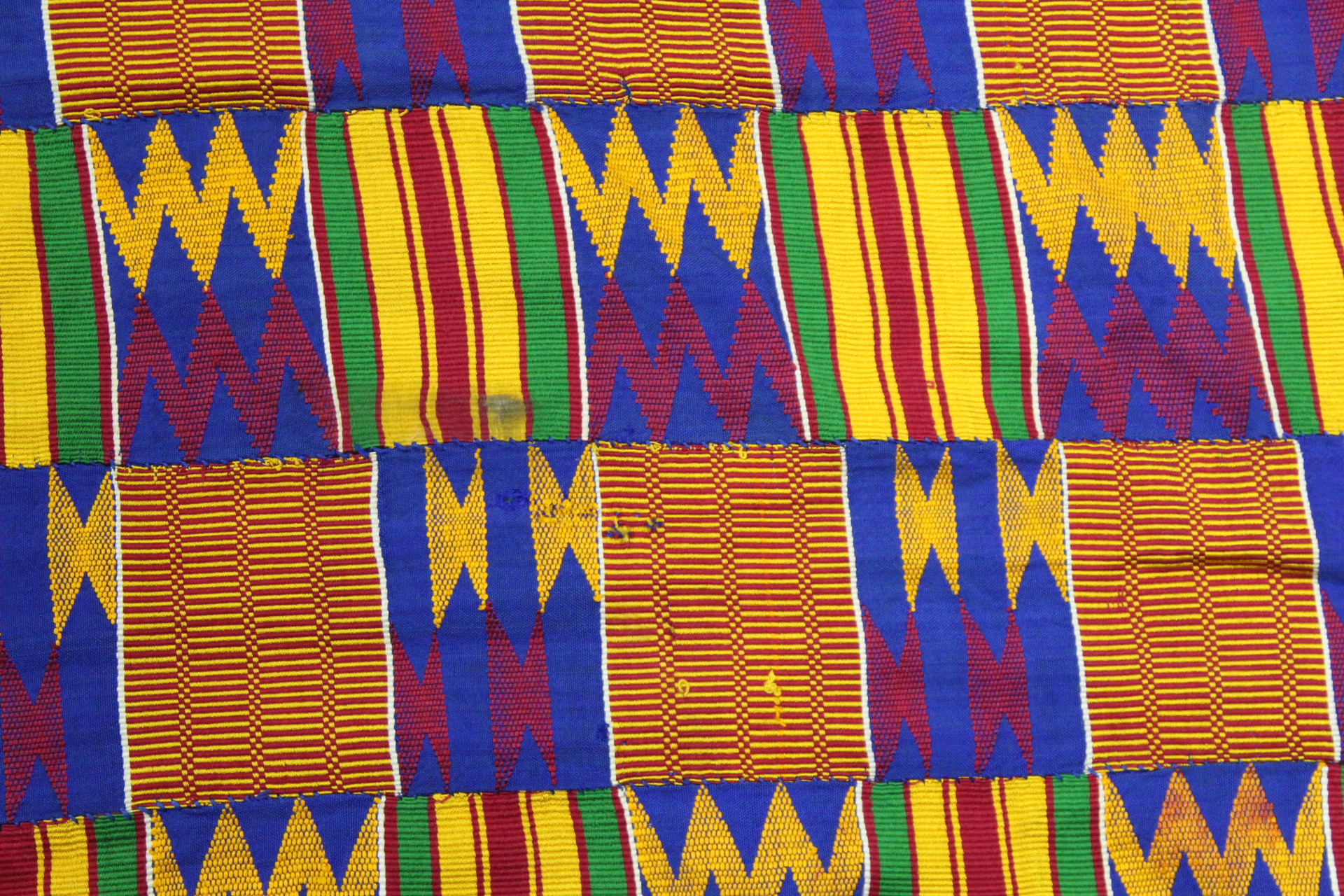 African Asanti Kente cloth in woven silk and cotton fabrics in predominantly blue, yellow, green and - Image 3 of 11