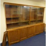 Exceptionally large mid 20th century modernist library bookcase, the bookshelves with four sliding