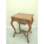 Victorian mahogany sewing/work table, the shaped hinged top enclosing pigeon holes with covers above