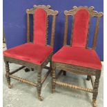 Set of ten 19th century dark oak carved dining chairs with scrolled top rails, pierced padded backs