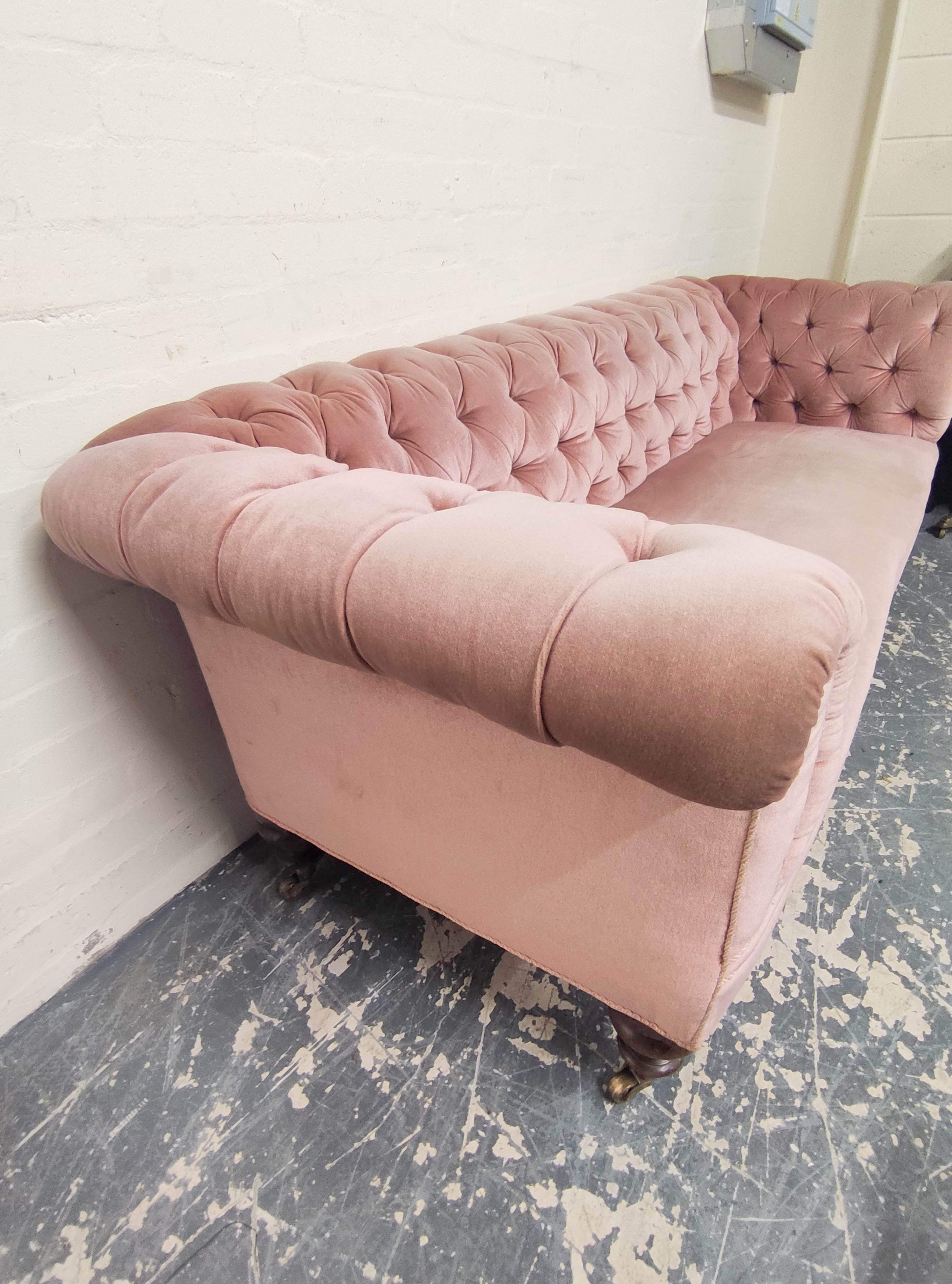 Victorian Chesterfield style sofa upholstered in later pink button back velour, on mahogany turned - Image 3 of 4