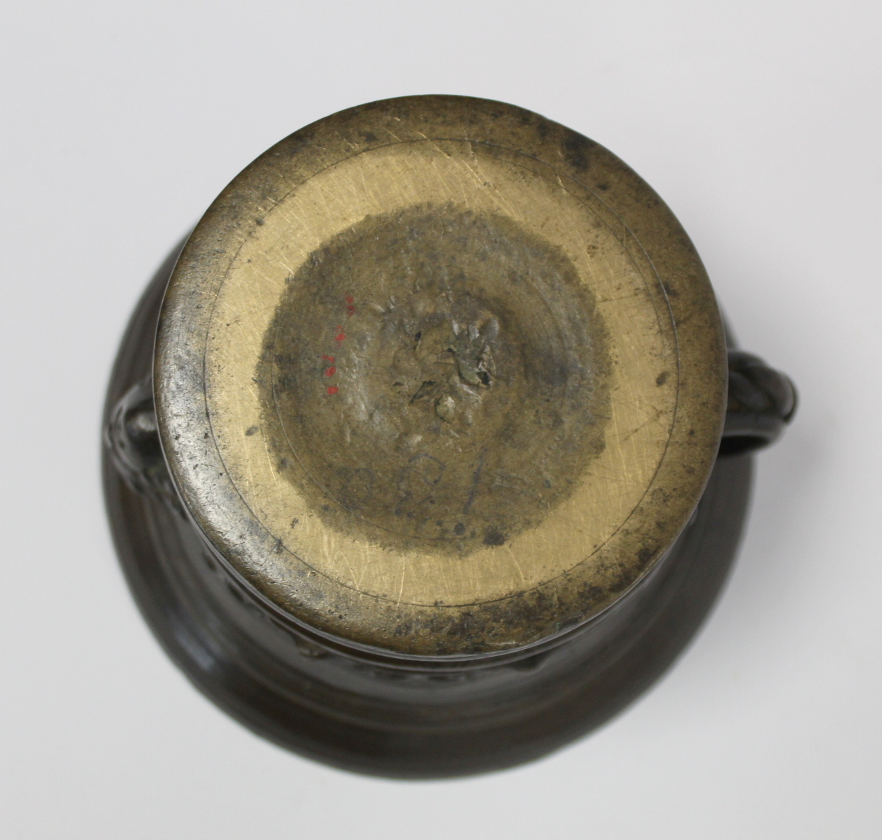 17th century bronze mortar and pestle, the mortar of flared circular form with single rope twist - Image 6 of 7