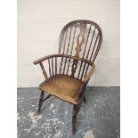 Ash Windsor armchair, the hoop frame with spindle back and pierced splat, on turned supports, united