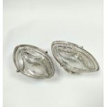 Attractive pair of oval sweetmeat baskets of Neo Classical style, with pierced and embossed swags