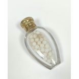 Mid 19th century plain glass smelling salts bottle with engraved and initialled gold sprung cap, 9.
