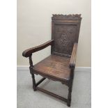 Oak wainscot chair, c.1900, with panel back and solid seat, carved CR 1900 (Charles Roberts MP)