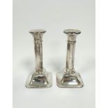 Pair of silver candlesticks with octagonal stems, Birmingham 1924, 15cm (loaded).