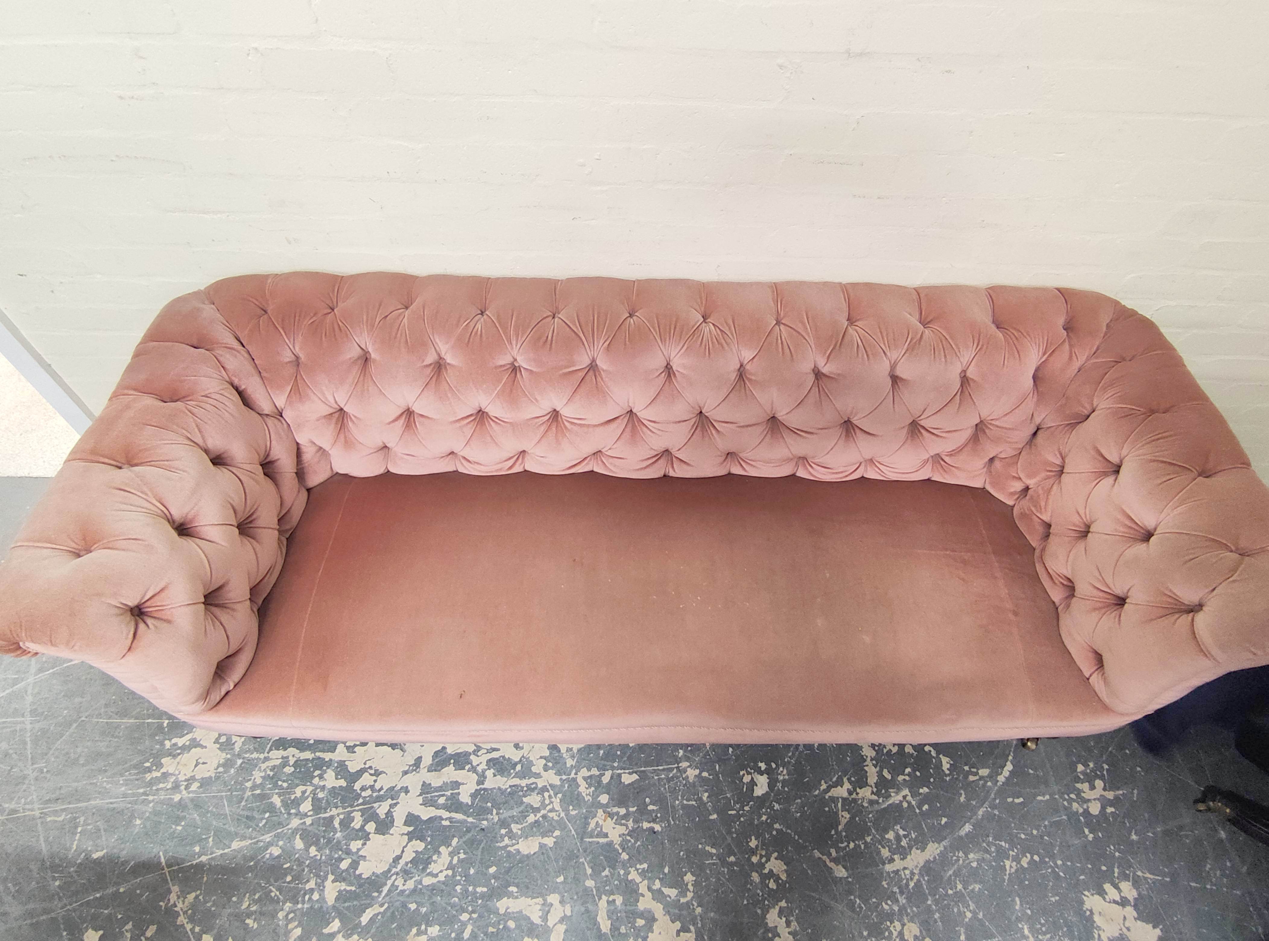 Victorian Chesterfield style sofa upholstered in later pink button back velour, on mahogany turned - Image 2 of 4