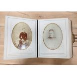 Photographs. Portraits. Victorian dark morocco album with clasp part filled with 24 studio