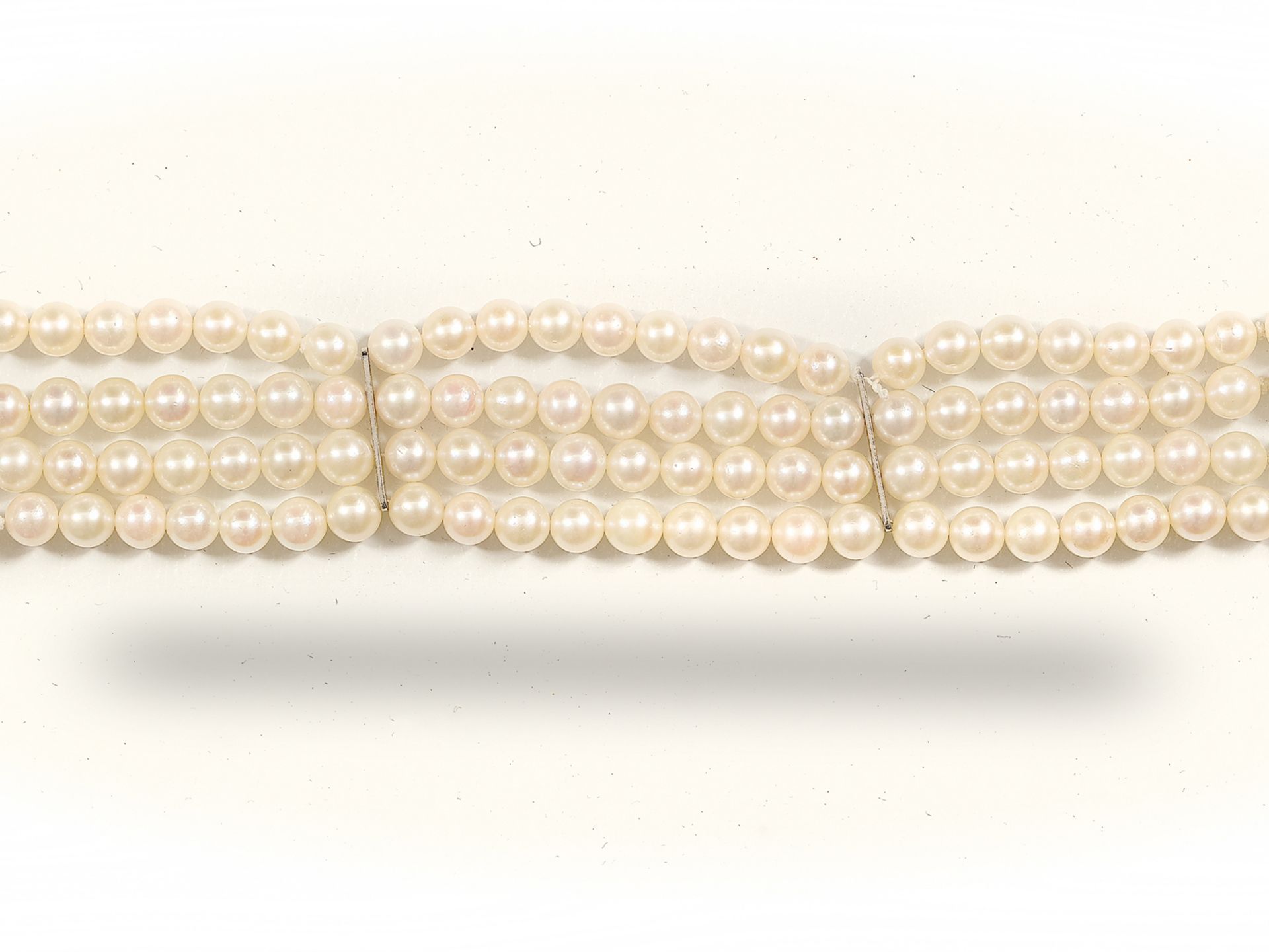 Bracelet of four rows of pearls, 
With white gold mounting and diamonds, 
Ca. 1970 - Image 2 of 4