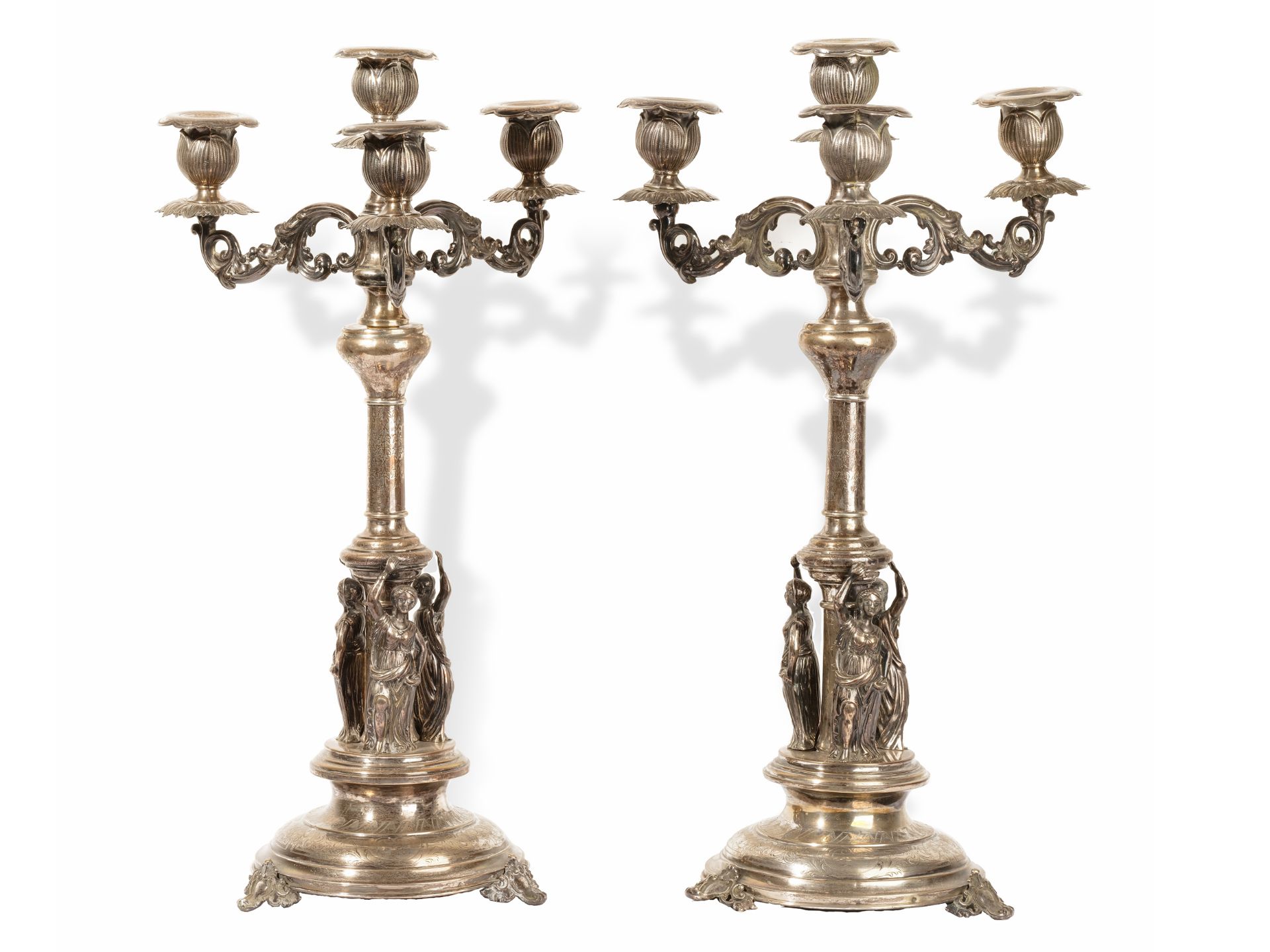 Pair of monumental candlesticks, 
Austria ca. 1900, 
Silver cast and chased
