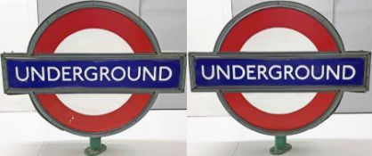 London Underground illuminated BULLSEYE SIGN as located outside stations. A double-facing unit
